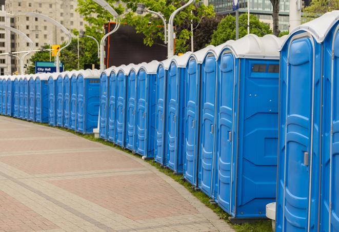 a row of portable restrooms at a trade show, catering to visitors with a professional and comfortable experience in Boardman OH